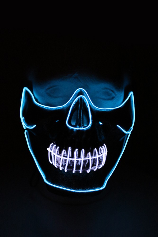 rave mask on face - skull