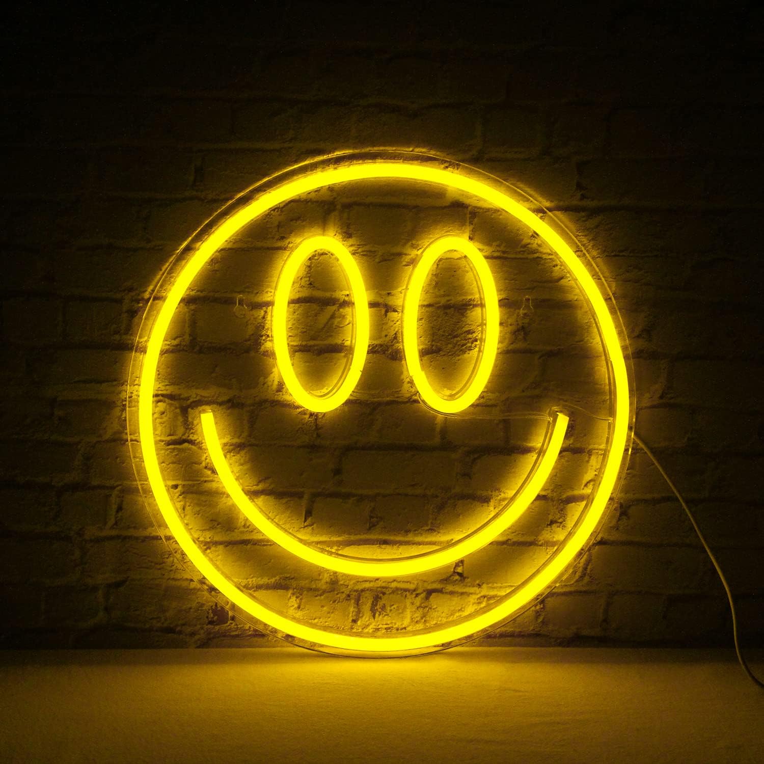 Smiley LED neon sign on the wall