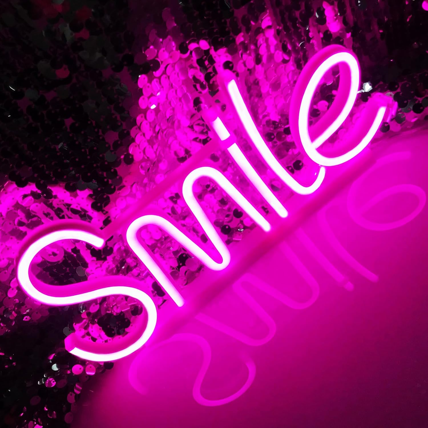 SMILE illuminated LED sign light on the wall hanging