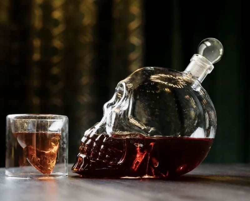 luxury decanter with skull glasses